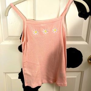 Pink tank top with flowers on it